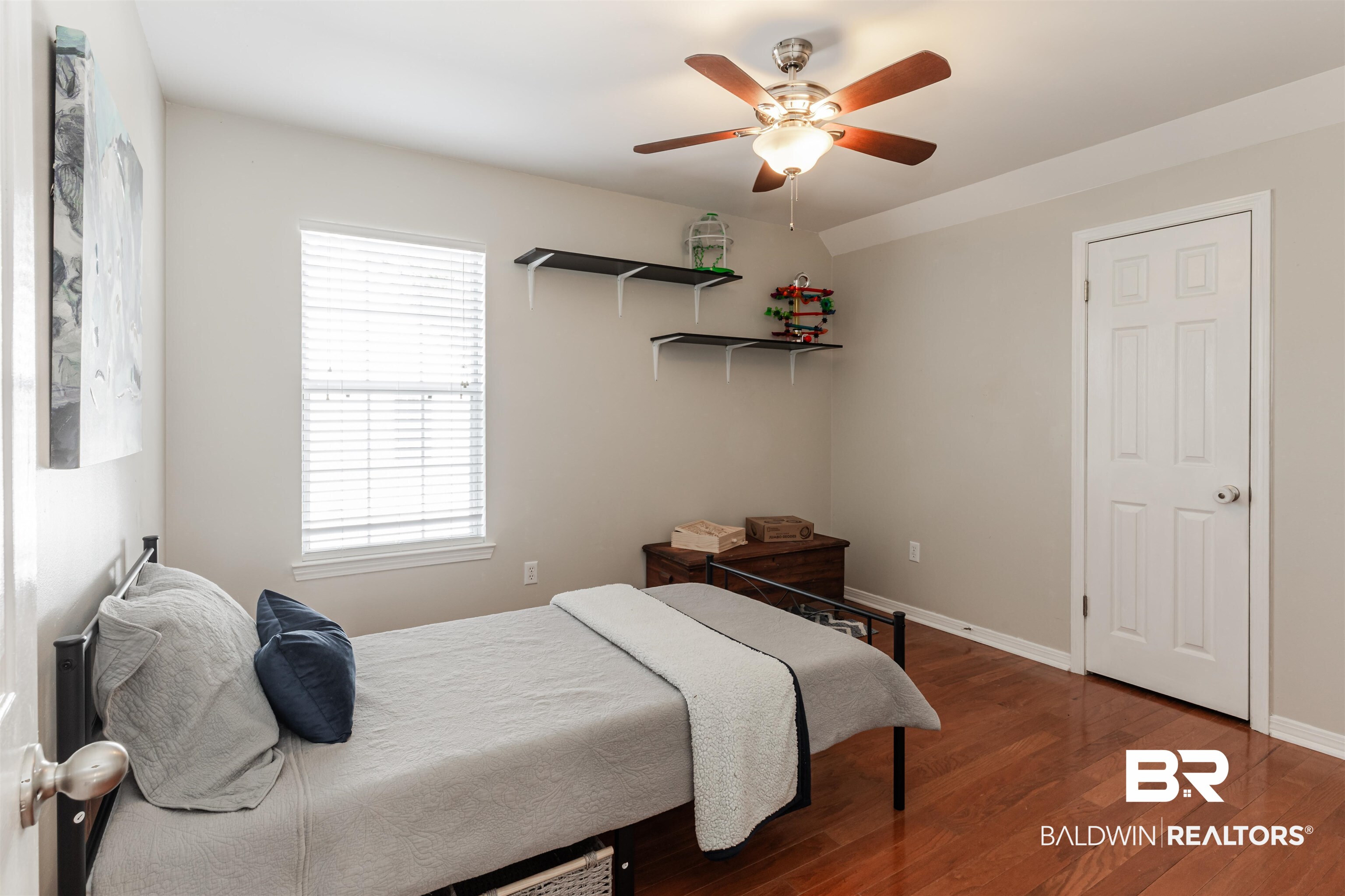 3844 Isabel Way South Mobile, AL 36693 - Photo 36 of 49 Bedroom with dark wood-type flooring and ceiling fan