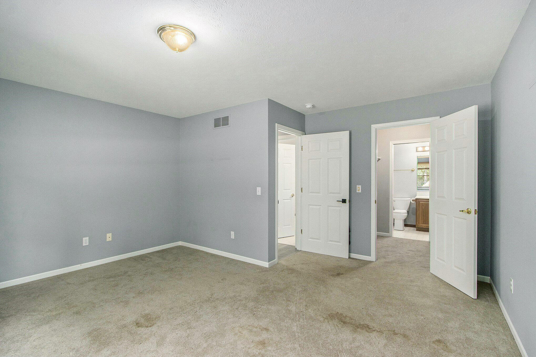 5965 Wood Valley Road Kalamazoo, MI 49009 - Photo 11 of 30 Main floor bedroom, WIC, ensuite