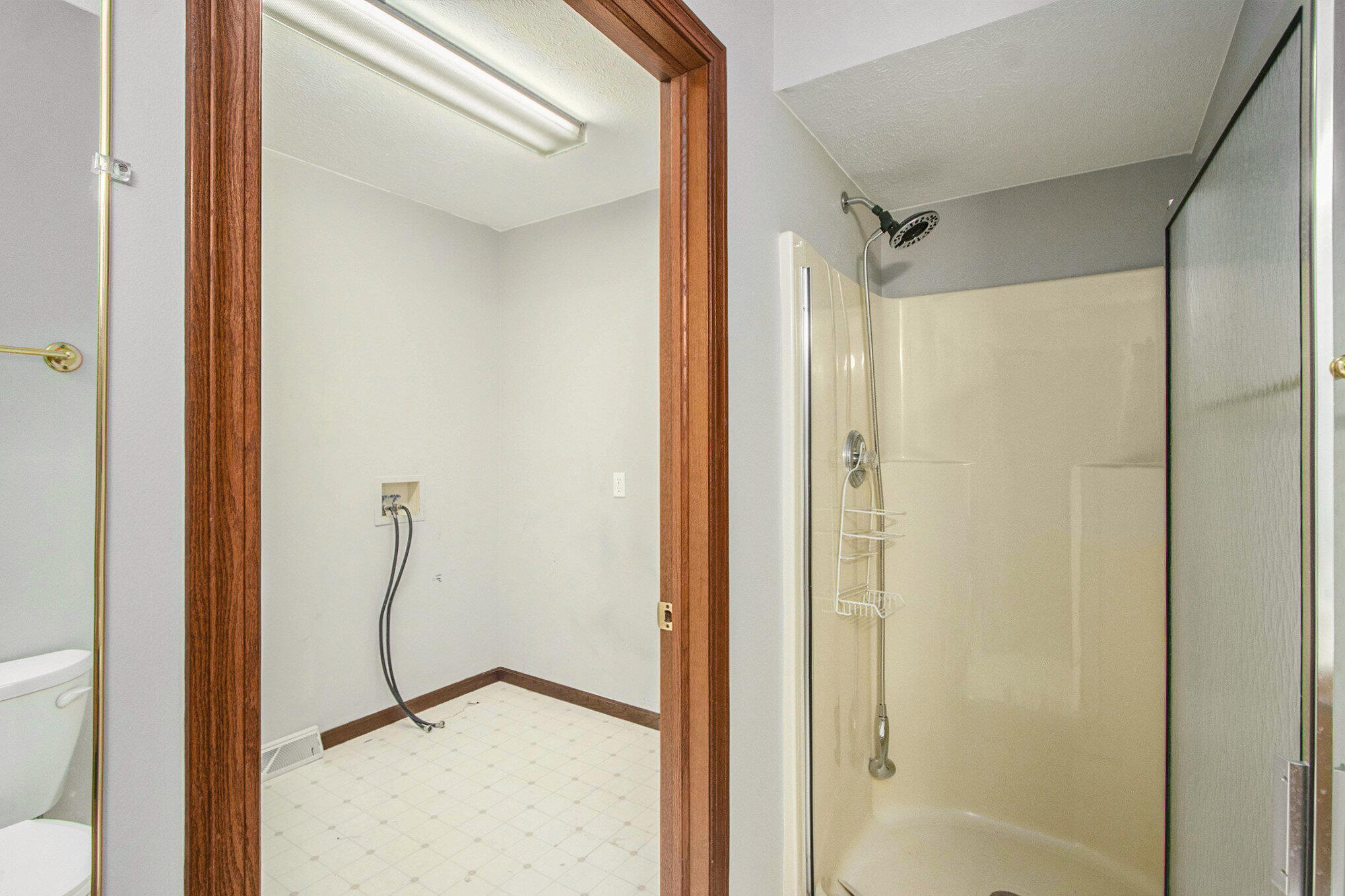 5965 Wood Valley Road Kalamazoo, MI 49009 - Photo 10 of 30 Main floor laundry and full bathroom