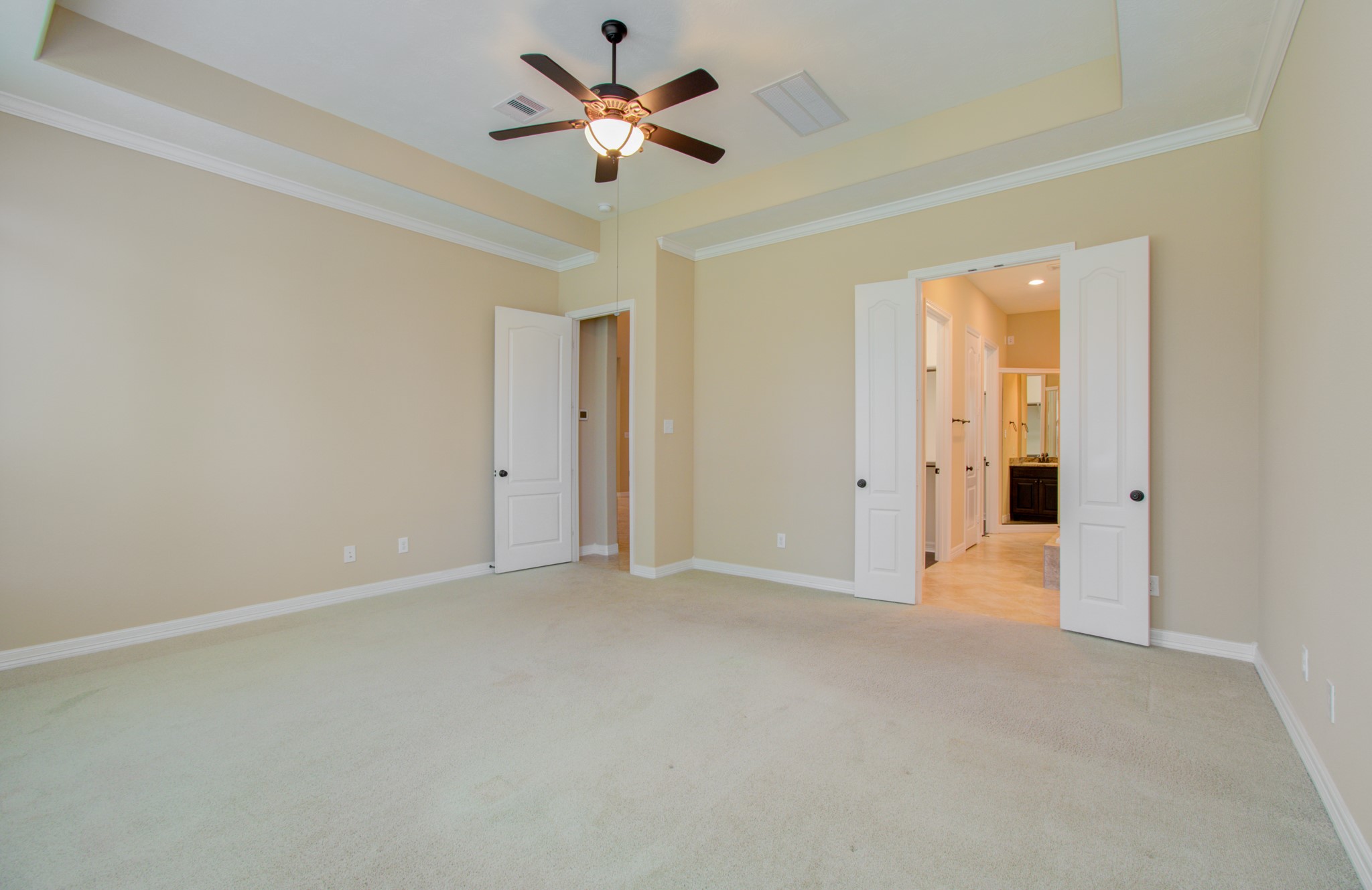 3938 May Ridge Lane Sugar Land, TX 77479 - Photo 20 of 40 an empty room with a ceiling fan and a window