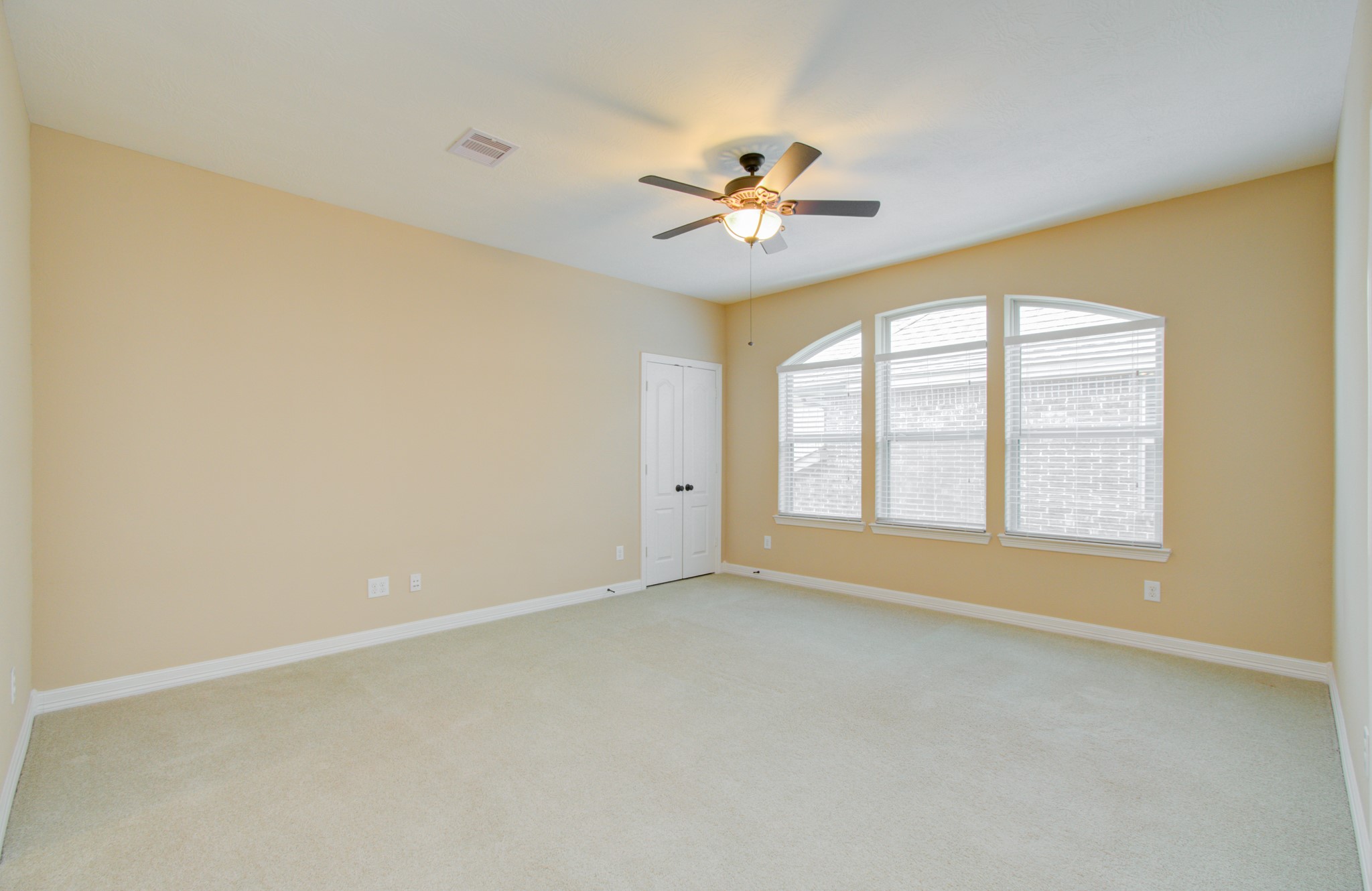 3938 May Ridge Lane Sugar Land, TX 77479 - Photo 27 of 40 a view of an empty room with chandelier fan and fire place