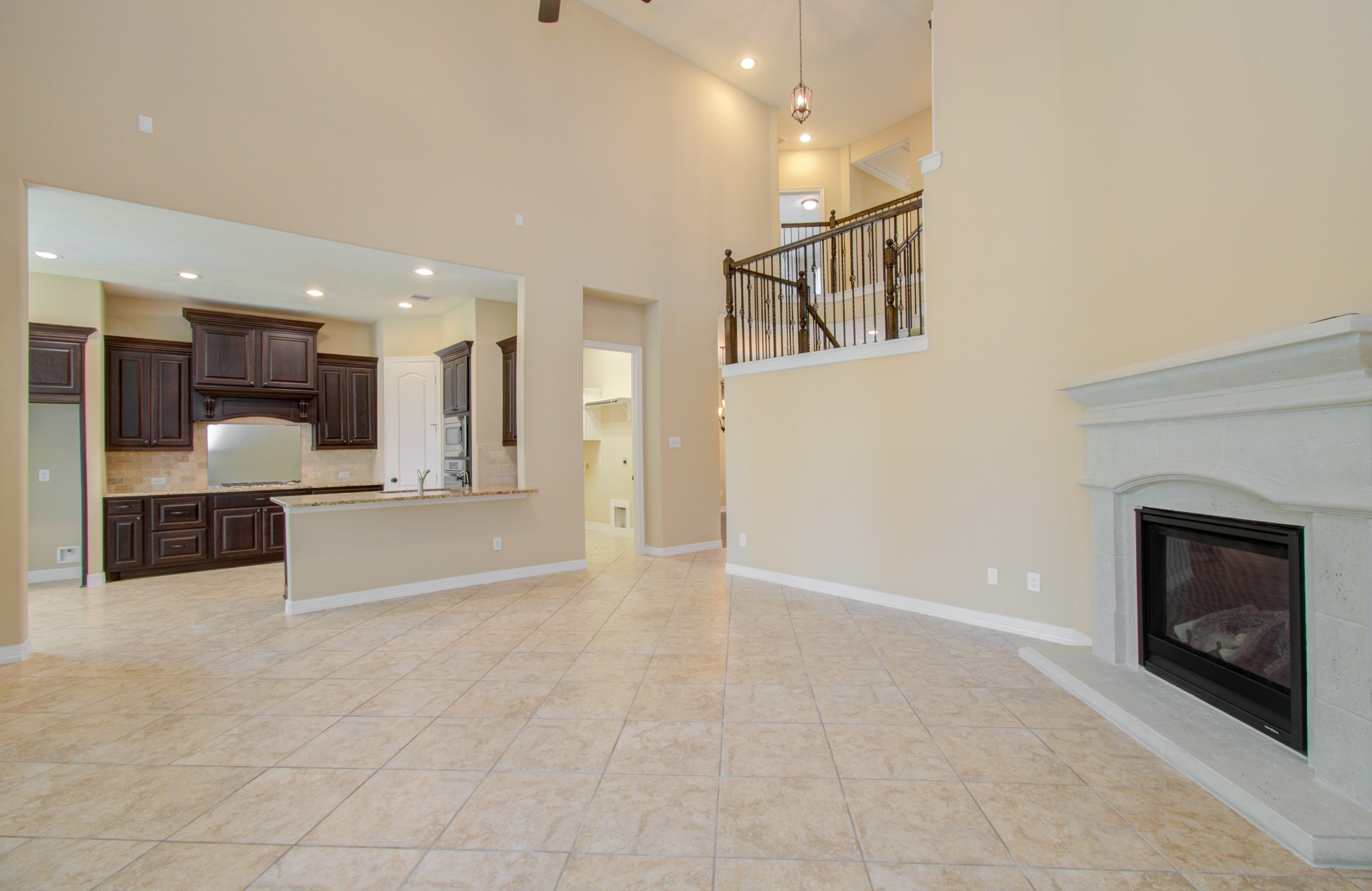 3938 May Ridge Lane Sugar Land, TX 77479 - Photo 8 of 40 a view of an empty room and kitchen view