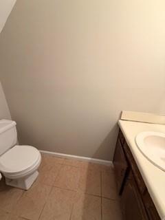 1846 Sturgeon Road Buford, GA 30518 - Photo 9 of 14 a bathroom with a toilet and a sink