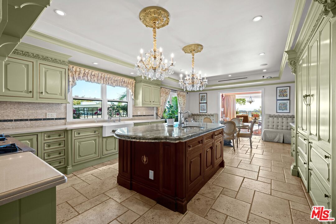 1575 Alexis Place Beverly Hills, CA 90210 - Photo 20 of 75 a view of a kitchen with granite countertop a sink and dishwasher