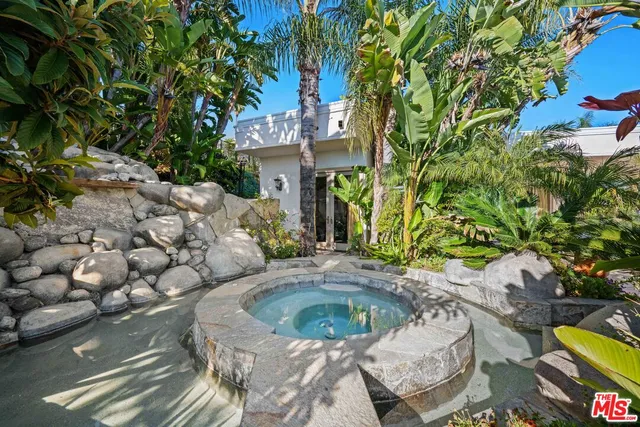 a view of a lake with a bench in front of lake