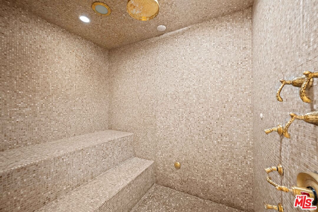 1575 Alexis Place Beverly Hills, CA 90210 - Photo 64 of 75 a bathroom with a shower