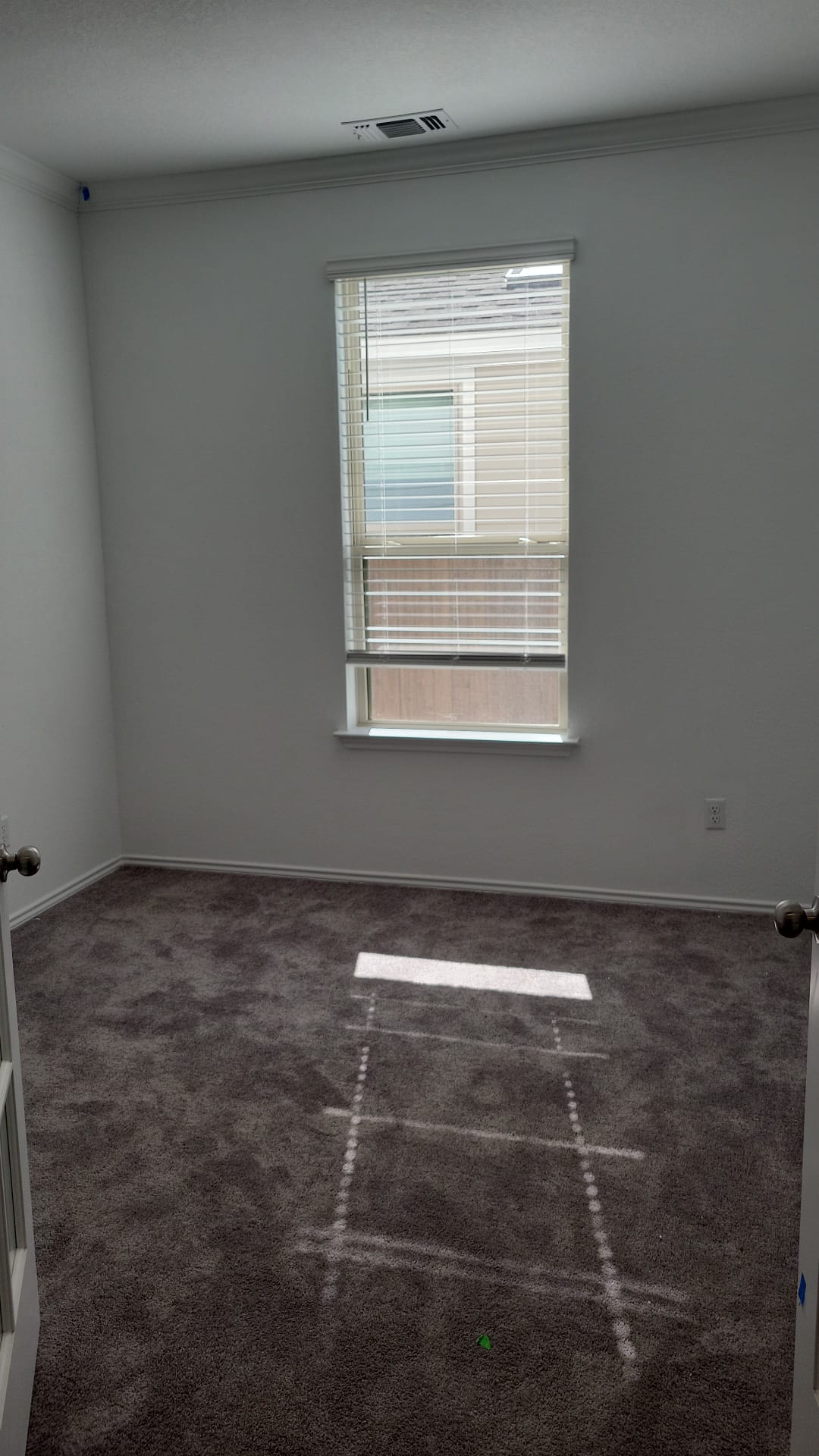 541 Pickrell Loop Georgetown, TX 78628 - Photo 4 of 32 This room features neutral-toned walls, a window with blinds, and plush carpeting
