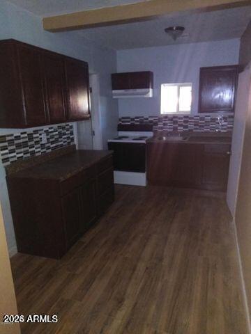1333 West Taylor Street Phoenix, AZ 85007 - Photo 6 of 6 a kitchen with stainless steel appliances granite countertop a refrigerator and a stove