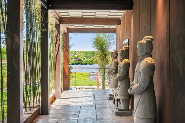 an aerial view of a house with a lake view