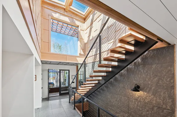 a view of entryway with a front door