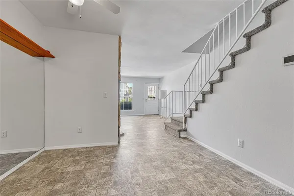 a view of hallway with stairs