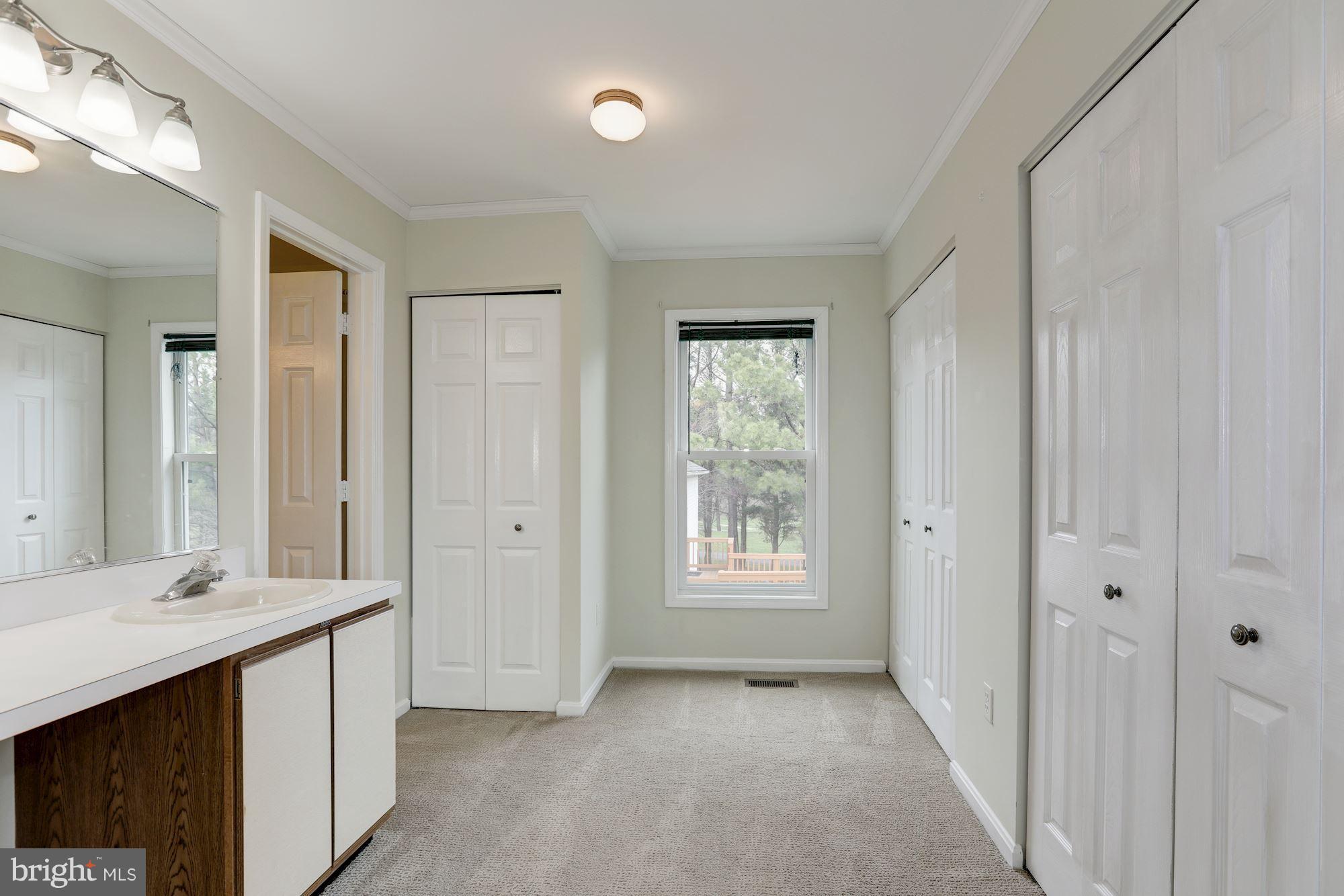 3504 Cedars Stable Road Davidsonville, MD 21035 - Photo 13 of 24 Master Bedroom Dressing Area with closets