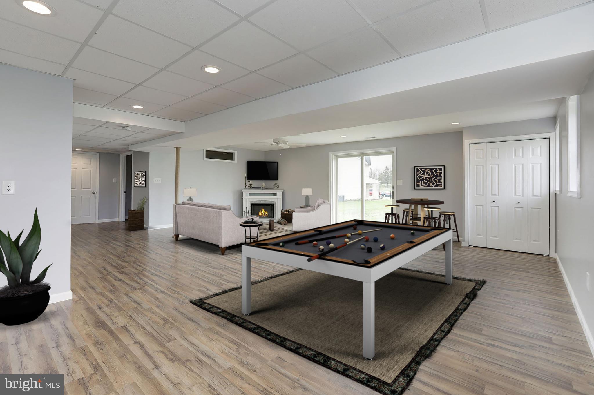 3504 Cedars Stable Road Davidsonville, MD 21035 - Photo 20 of 24 Lower Level Great Room with fireplace,