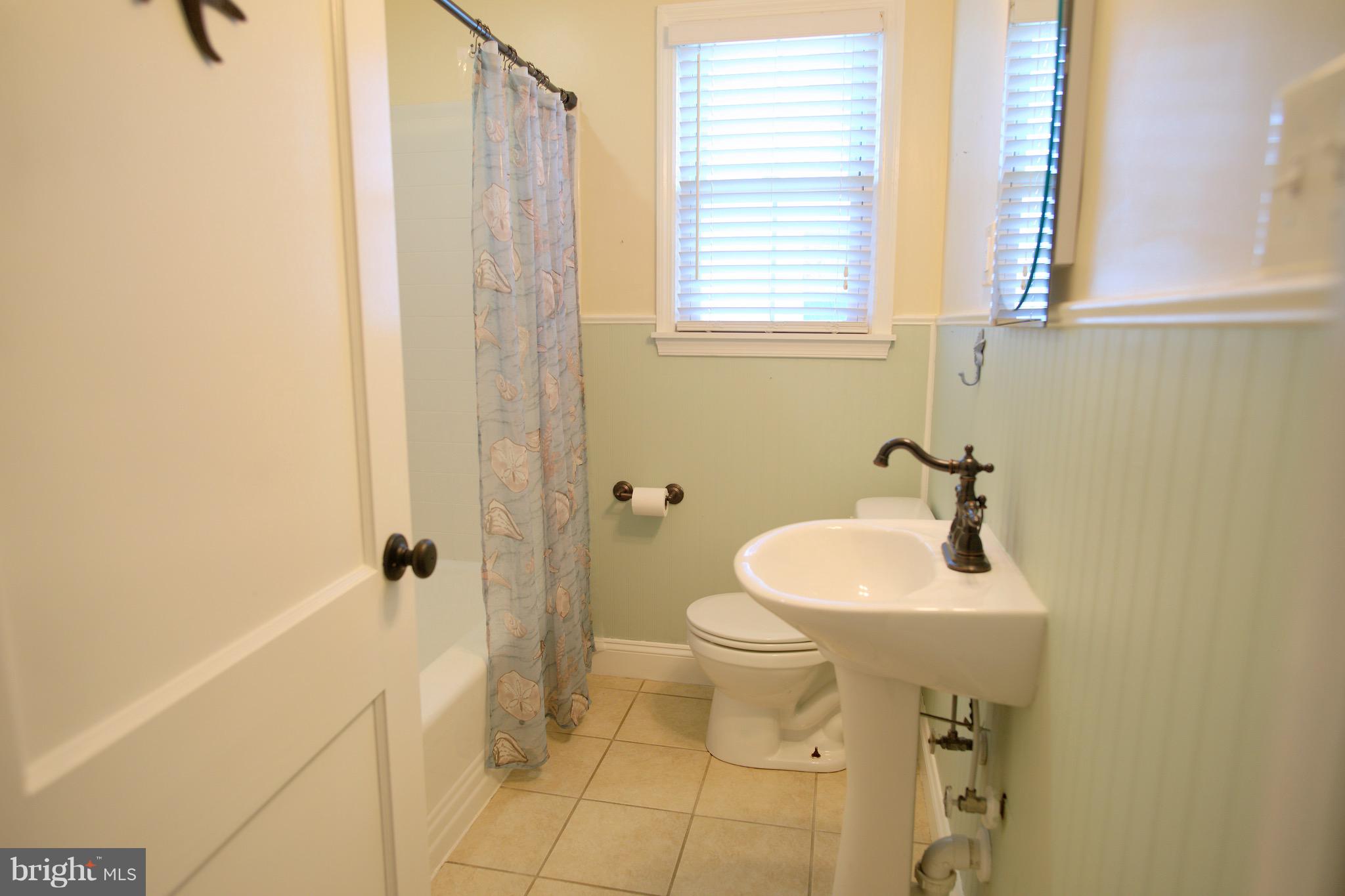 8434 Arbutus Road Pasadena, MD 21122 - Photo 16 of 24 Bathroom #1