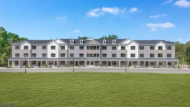 a view of building with an outdoor space and seating