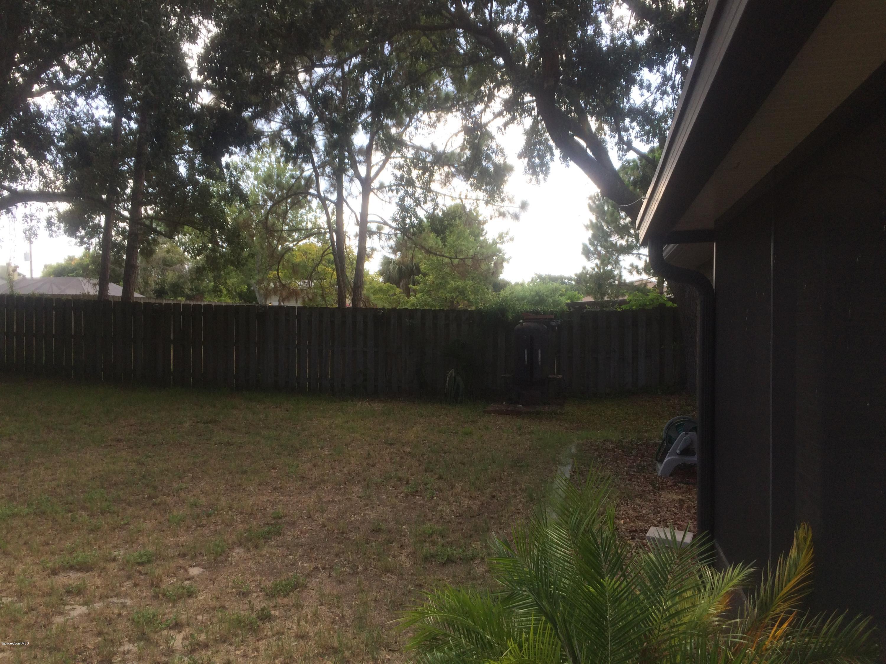 4671 Alfred Street Cocoa, FL 32927 - Photo 17 of 19 a view of backyard with green space