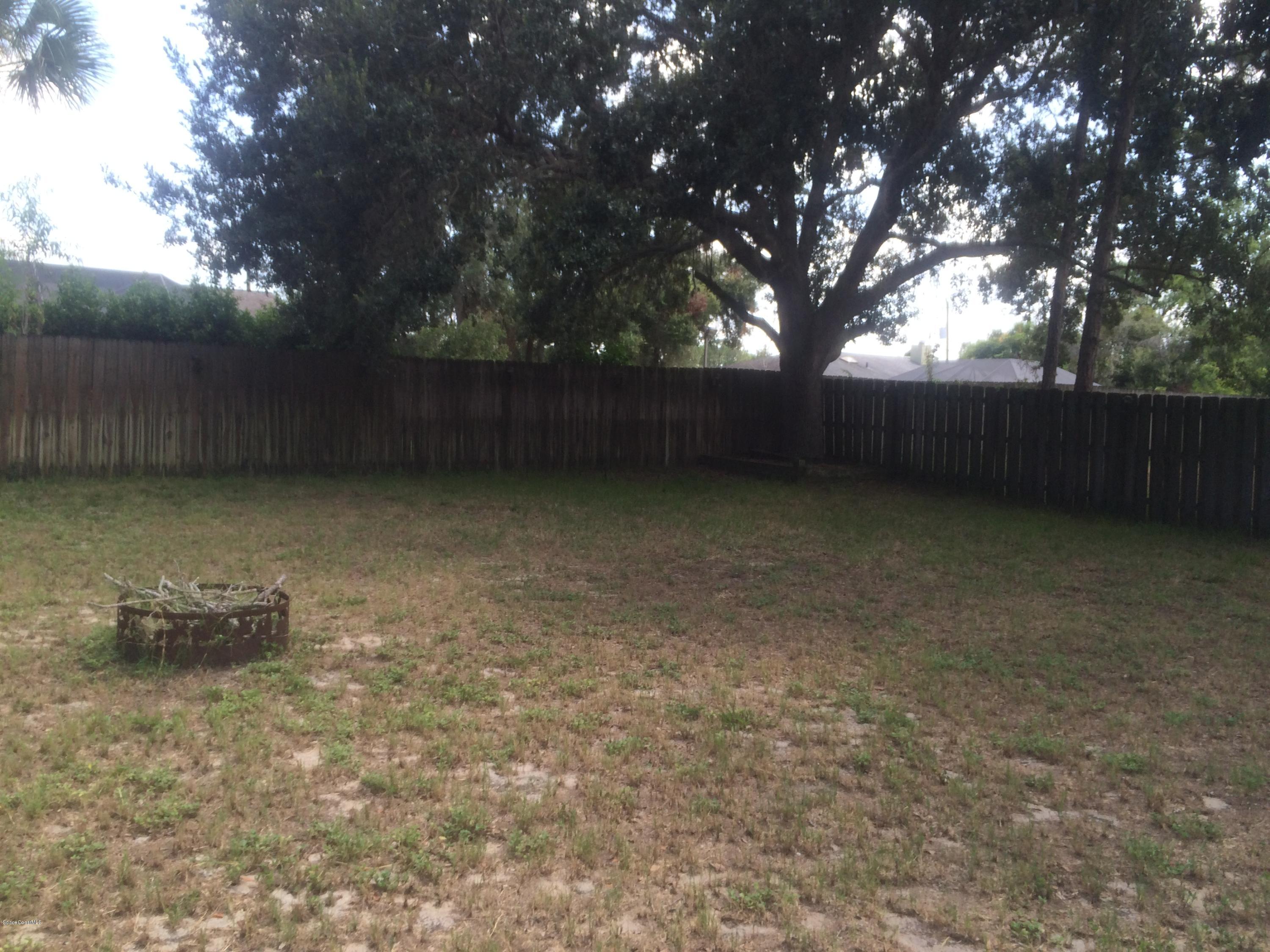 4671 Alfred Street Cocoa, FL 32927 - Photo 19 of 19 a view of a backyard