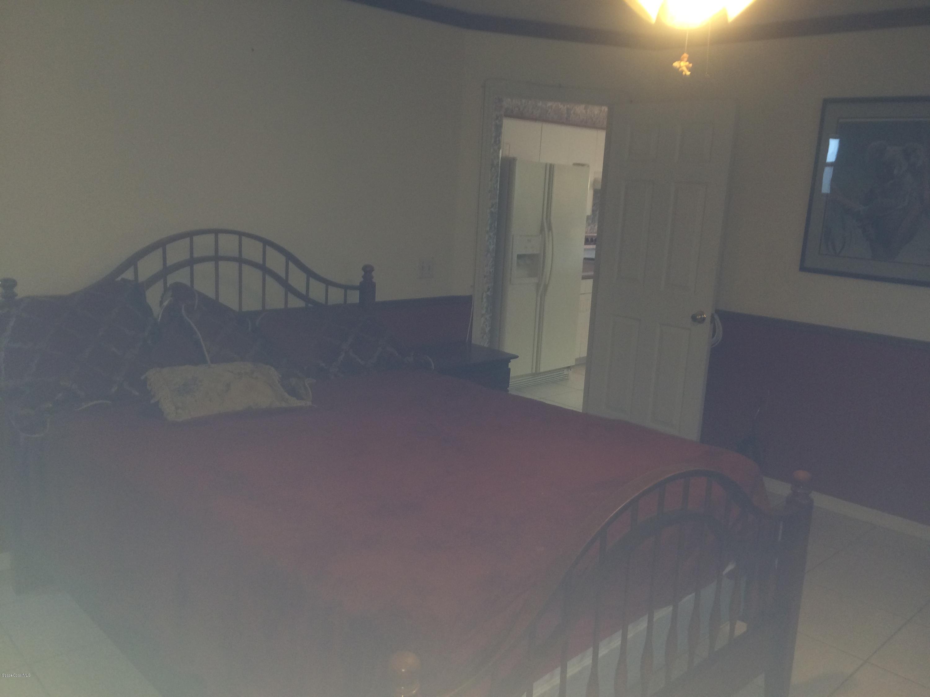 4671 Alfred Street Cocoa, FL 32927 - Photo 8 of 19 a view of water heater room