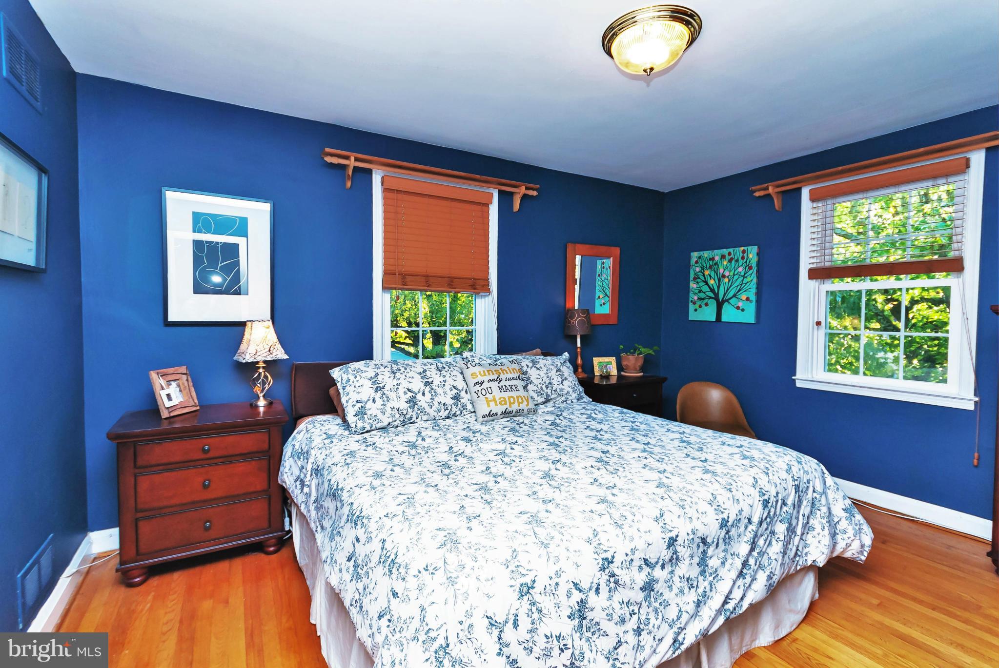 7045 Heathfield Road Baltimore, MD 21212 - Photo 14 of 27 a bedroom with a bed and window