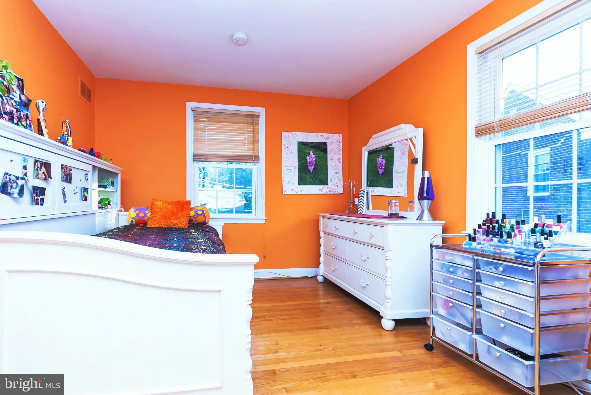 7045 Heathfield Road Baltimore, MD 21212 - Photo 17 of 27 a room with furniture and a dresser