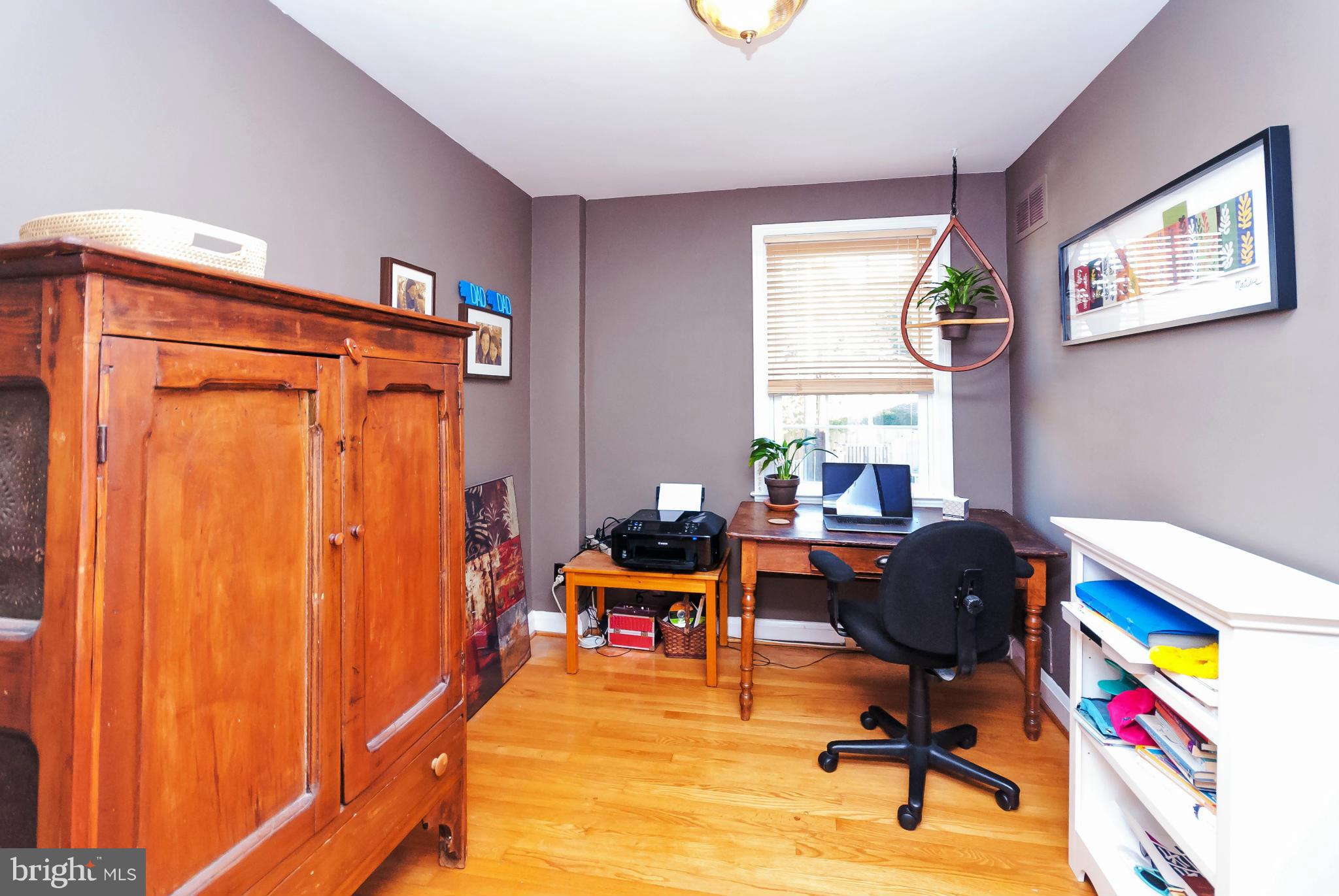 7045 Heathfield Road Baltimore, MD 21212 - Photo 19 of 27 a work room with furniture and a window