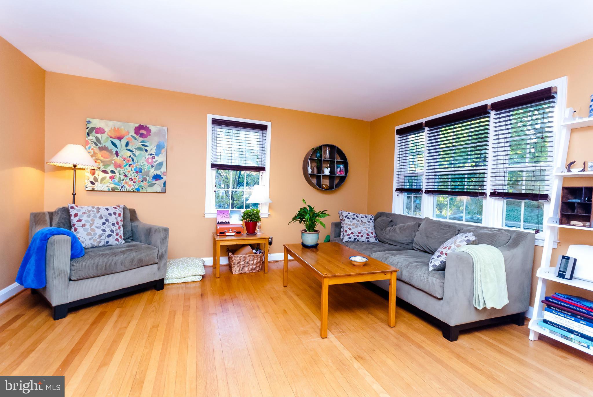 7045 Heathfield Road Baltimore, MD 21212 - Photo 4 of 27 a living room with furniture and a wooden floor
