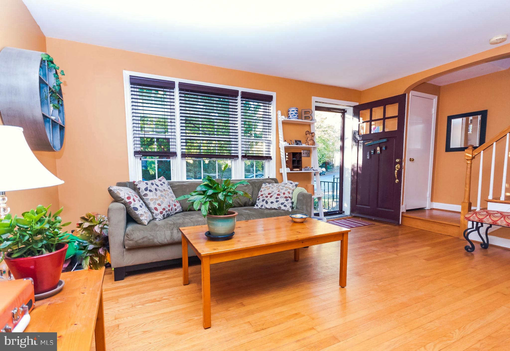 7045 Heathfield Road Baltimore, MD 21212 - Photo 6 of 27 a outdoor living space with furniture and a potted plant