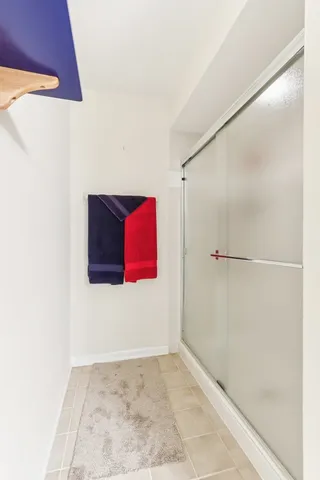 a view of a porch with chairs and backyard