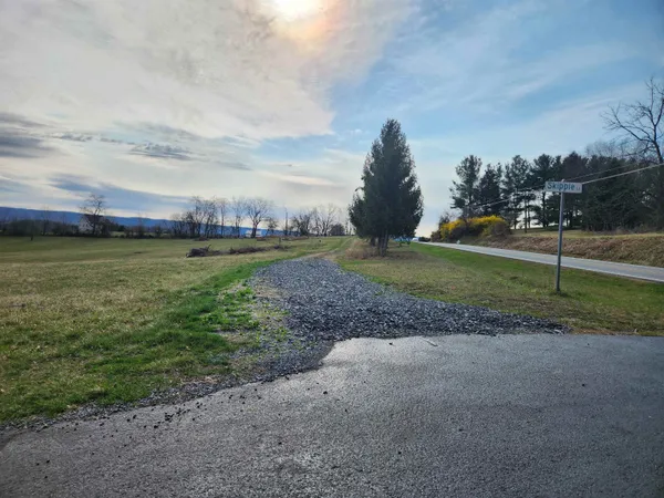a view of a golf course with a garden