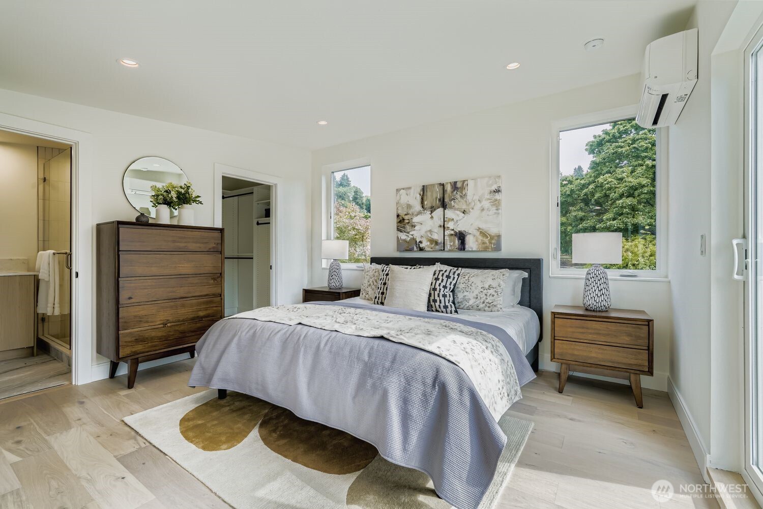 8814 41st Avenue Southwest Seattle, WA 98136 - Photo 15 of 38 a bedroom with a bed and a cabinets