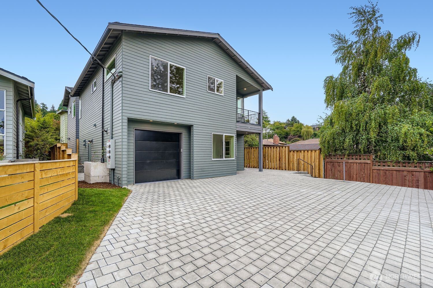 8814 41st Avenue Southwest Seattle, WA 98136 - Photo 38 of 38 a front view of a house with a yard