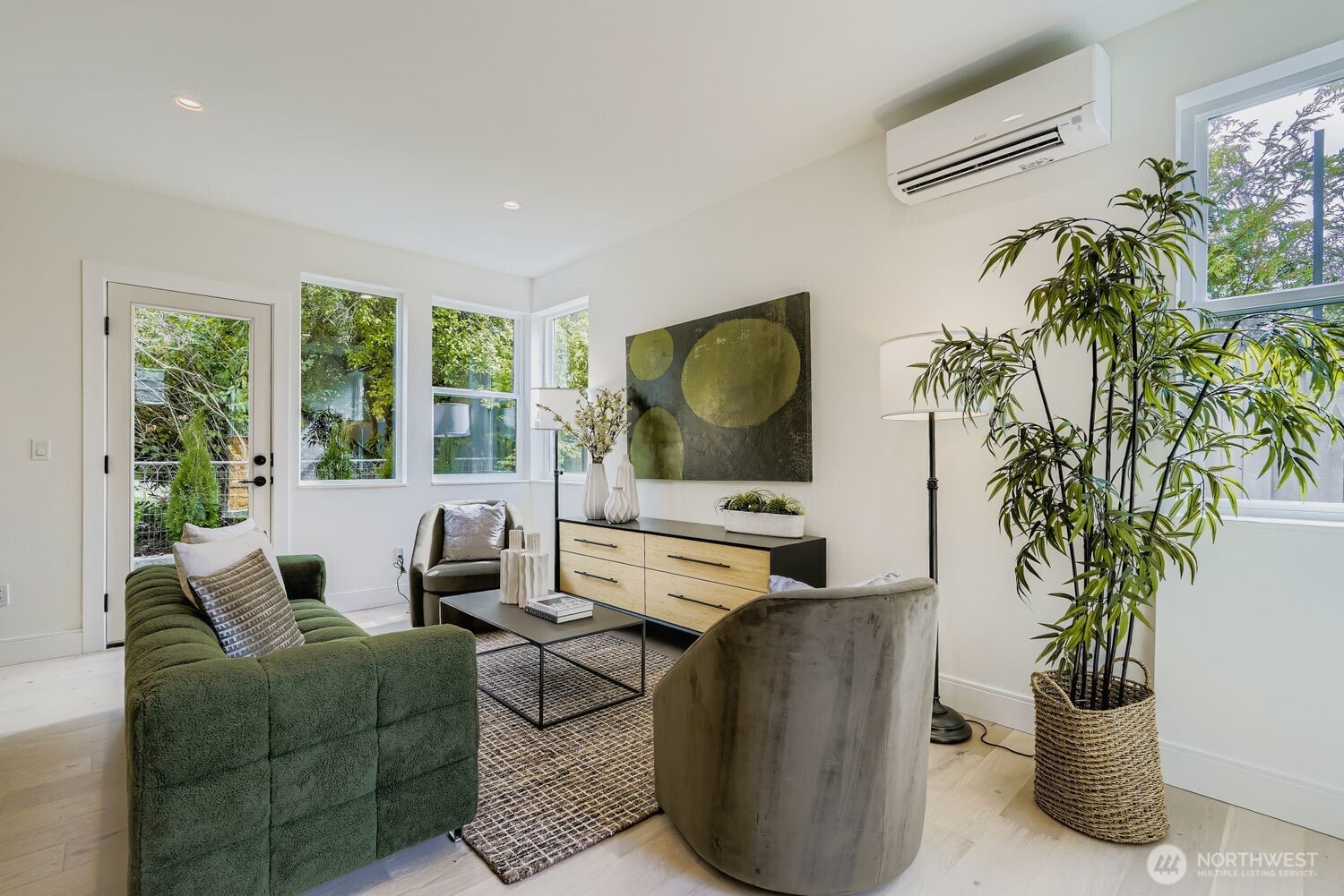 8814 41st Avenue Southwest Seattle, WA 98136 - Photo 5 of 38 a living room with furniture and a potted plant