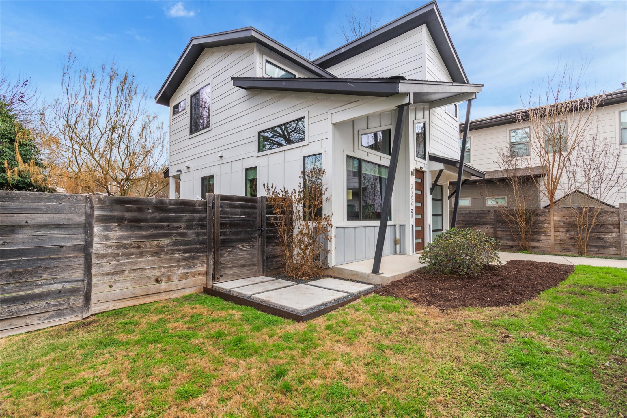 2706 Zaragosa Street, Unit 2 Austin, TX 78702 - Photo 16 of 25 A striking rear view showcasing the home's bold modern architecture and private backyard.