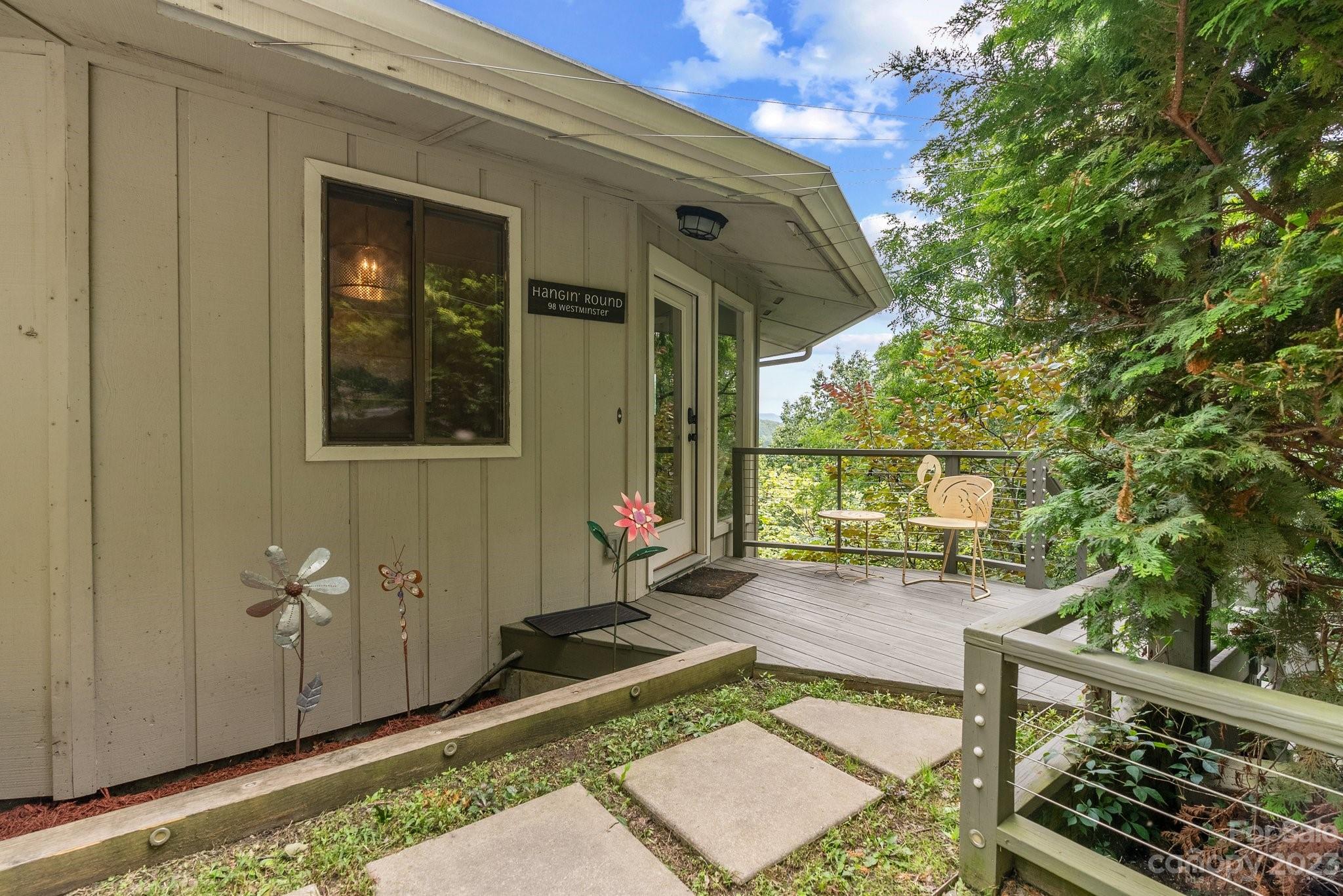 98 Westminster Road Montreat, NC 28711 - Photo 1 of 37 a view of a porch with furniture