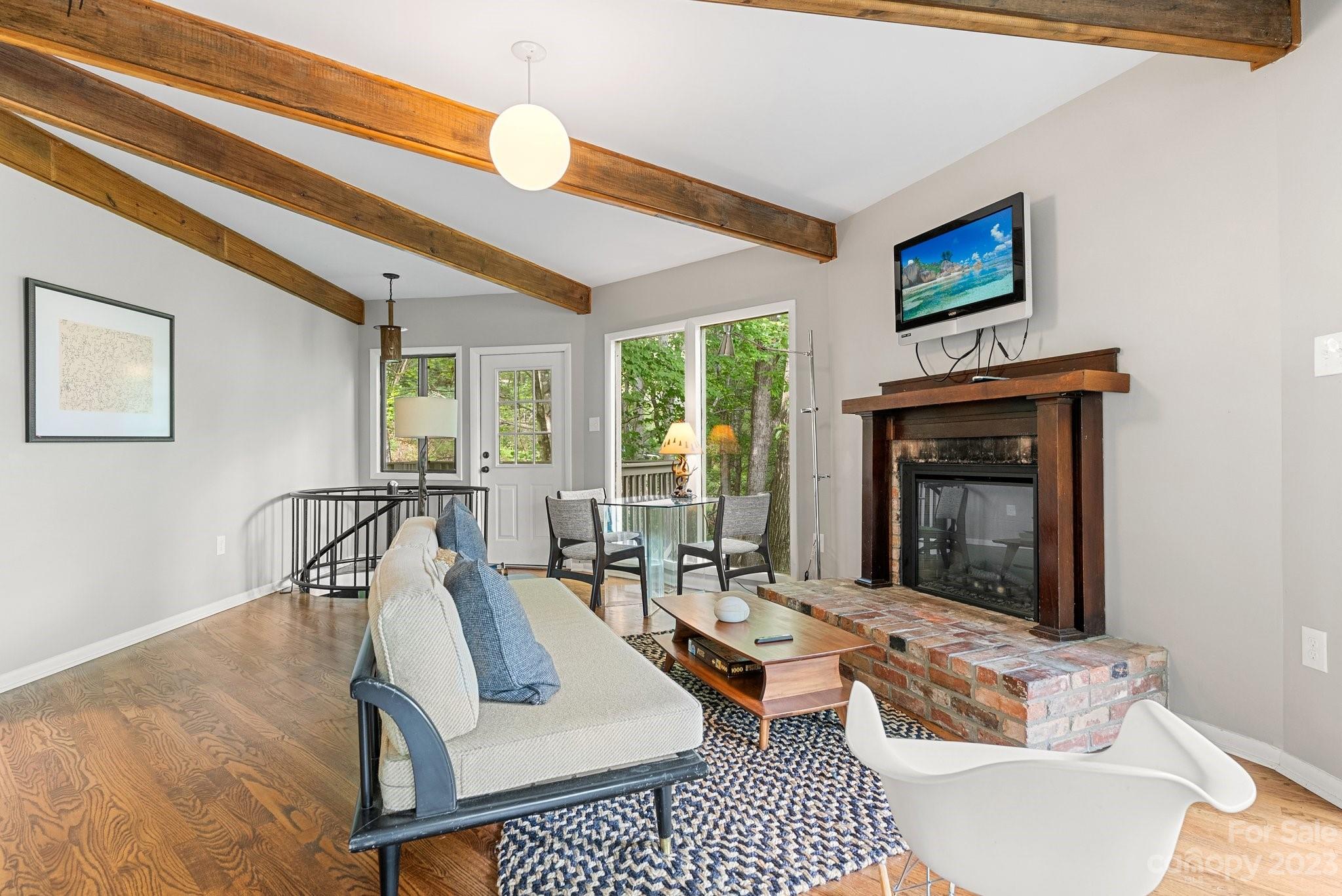 98 Westminster Road Montreat, NC 28711 - Photo 18 of 37 a living room with furniture and a fireplace