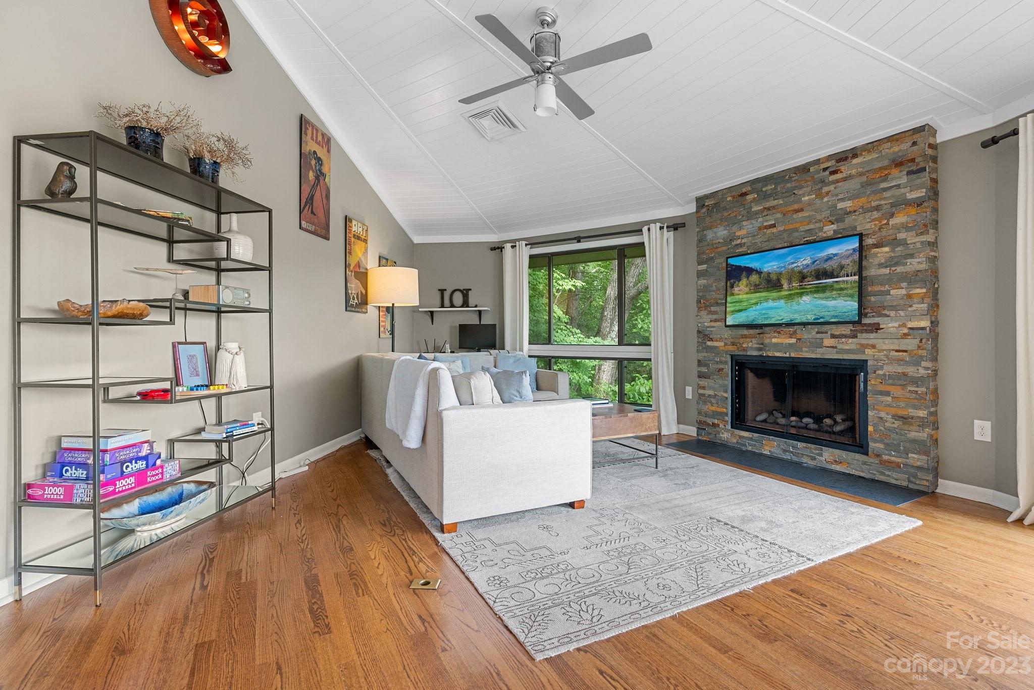 98 Westminster Road Montreat, NC 28711 - Photo 2 of 37 a living room with furniture and a fireplace