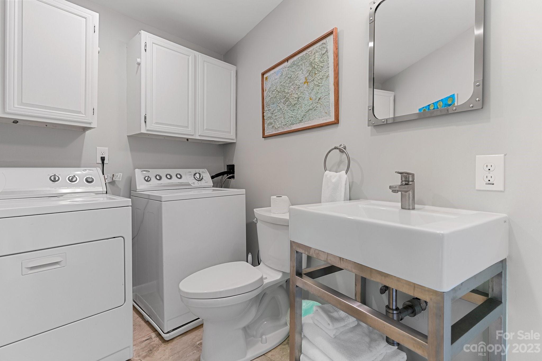 98 Westminster Road Montreat, NC 28711 - Photo 24 of 37 a bathroom with a sink toilet and vanity