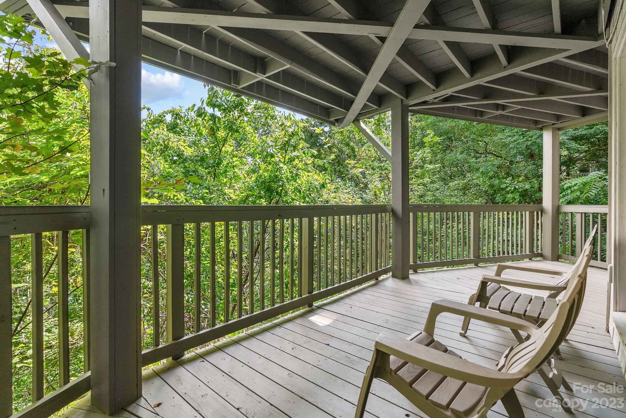 98 Westminster Road Montreat, NC 28711 - Photo 26 of 37 a view of a chairs in balcony