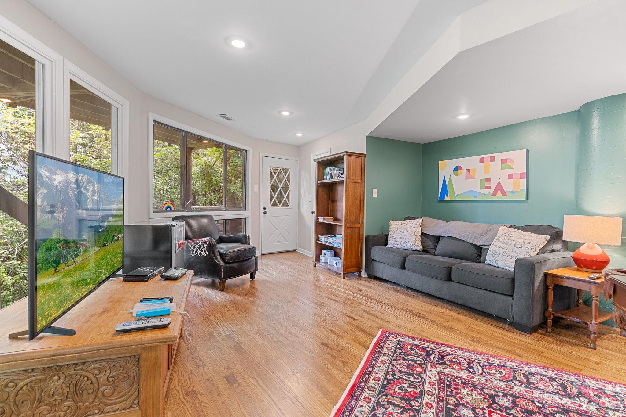 98 Westminster Road Montreat, NC 28711 - Photo 29 of 37 a living room with furniture and a flat screen tv