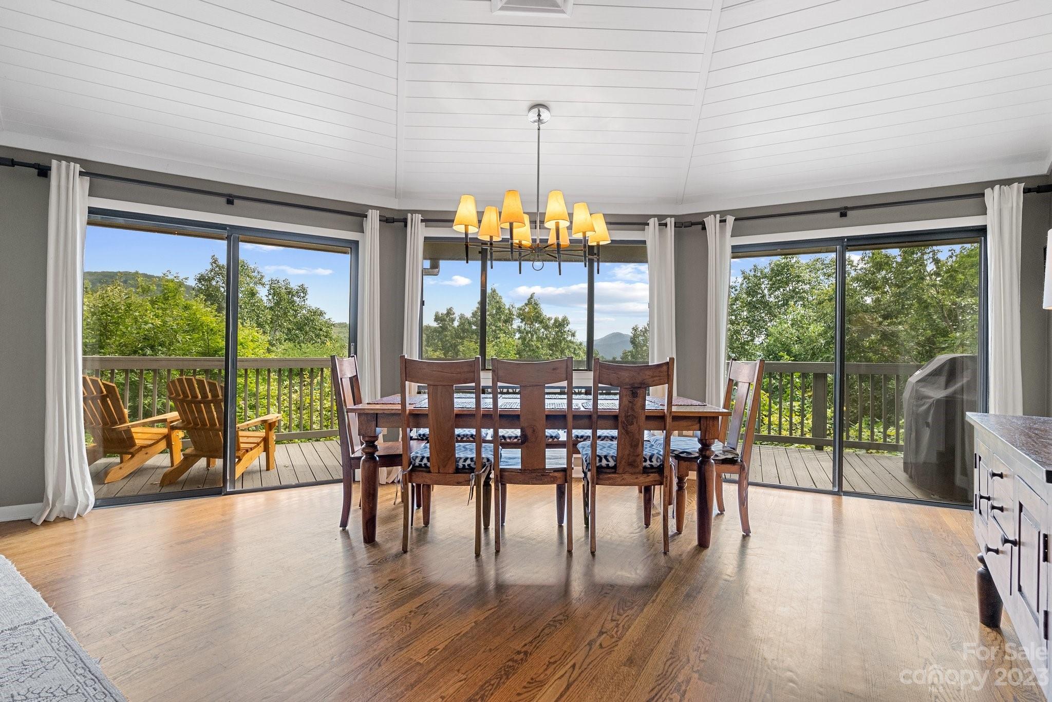 98 Westminster Road Montreat, NC 28711 - Photo 5 of 37 a view of a dining room with furniture window and wooden floor