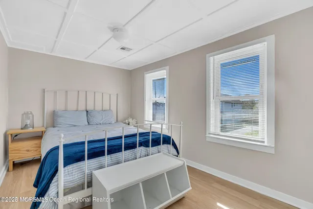 a bathroom with a granite countertop sink mirror and double