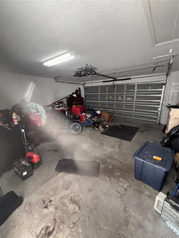 a kitchen with a sink cabinets and stainless steel appliances