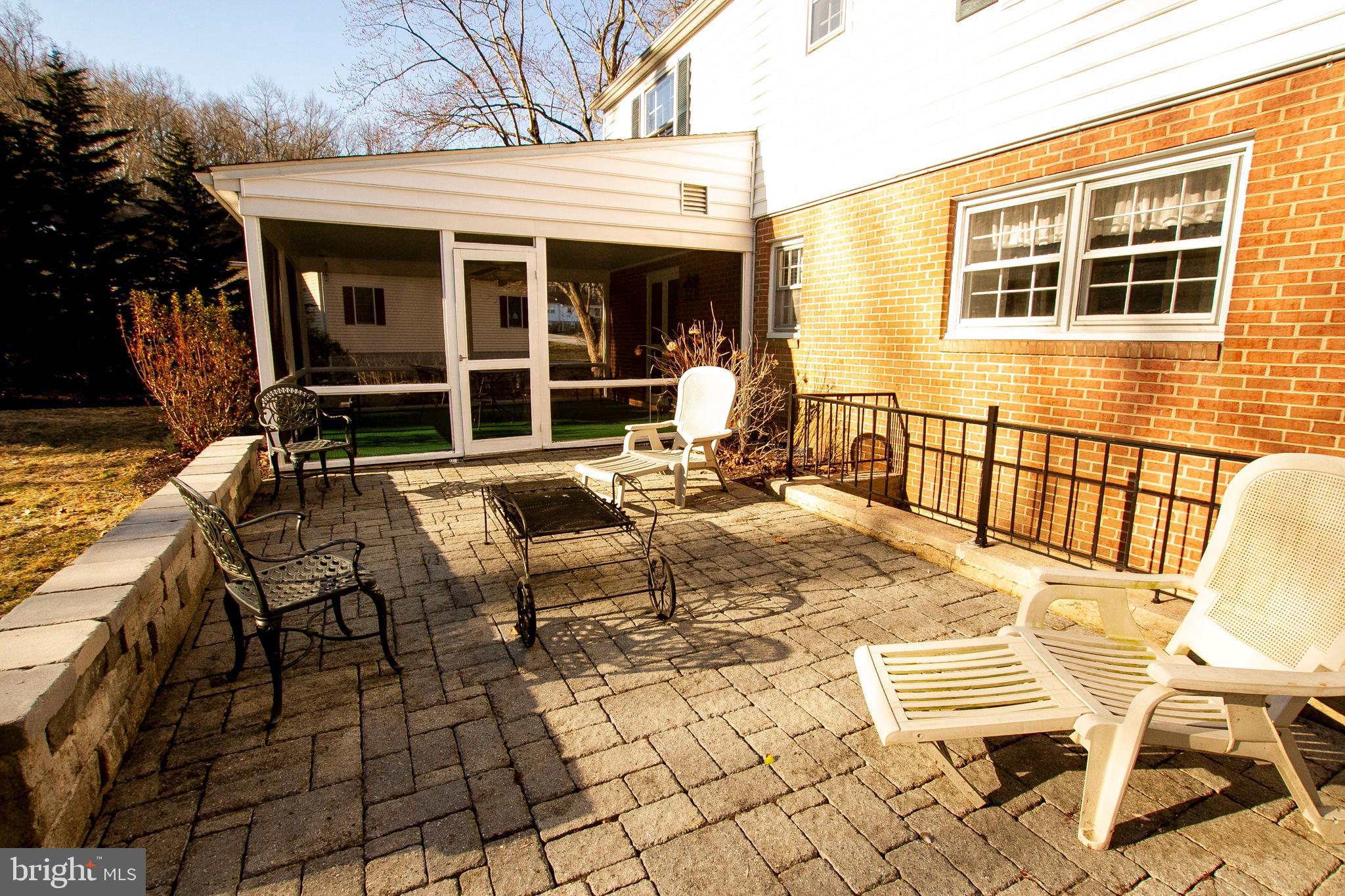 1201 Ridervale Road Towson, MD 21204 - Photo 31 of 37 Paver Patio off screened porch