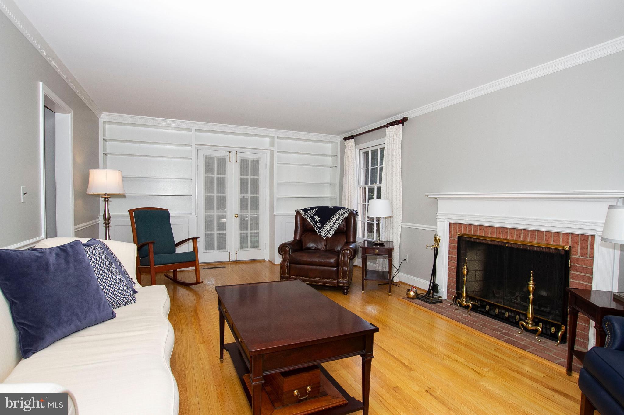 1201 Ridervale Road Towson, MD 21204 - Photo 6 of 37 Living room with wood burning fireplace
