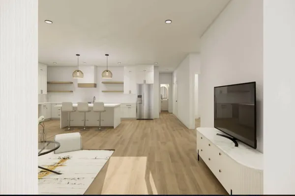 an aerial view of a house with a garden view