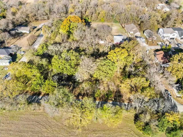 a view of backyard of a house