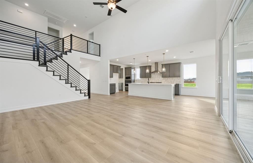 11169 Roxburgh Road Fort Worth, TX 76052 - Photo 7 of 22 *Floorplan representation, not actual home - Spacious gathering room with large windows
