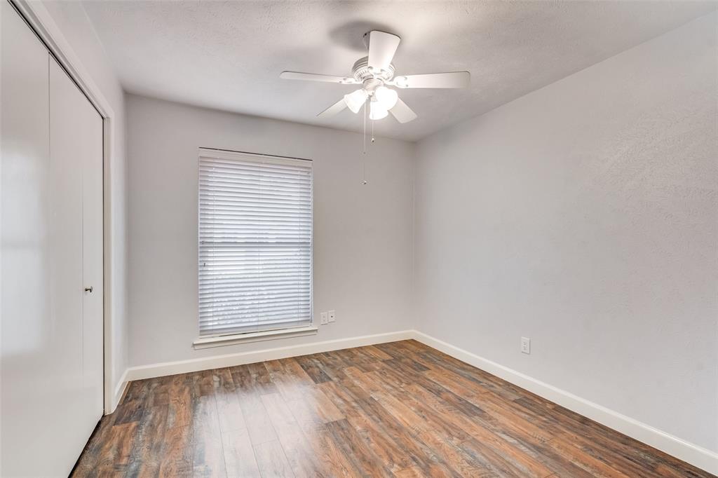 626 Shadyglen Drive Allen, TX 75002 - Photo 13 of 20 wooden floor in an empty room with a window