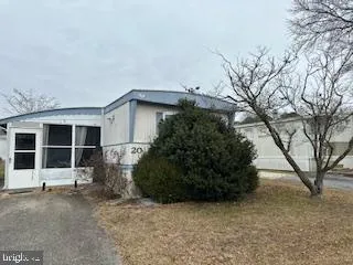 a view of a house with a garden