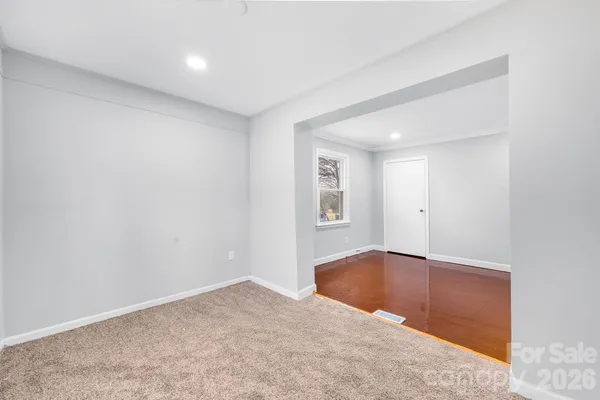an empty room with windows